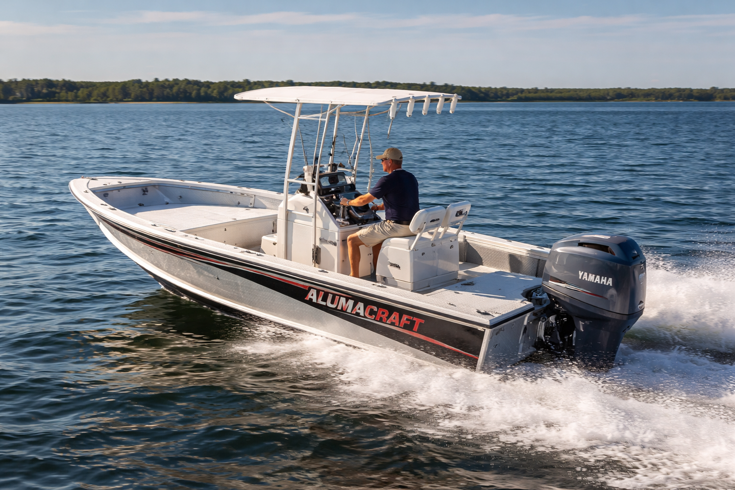 2003 Alumacraft 20CC center console aluminum boat running on open water