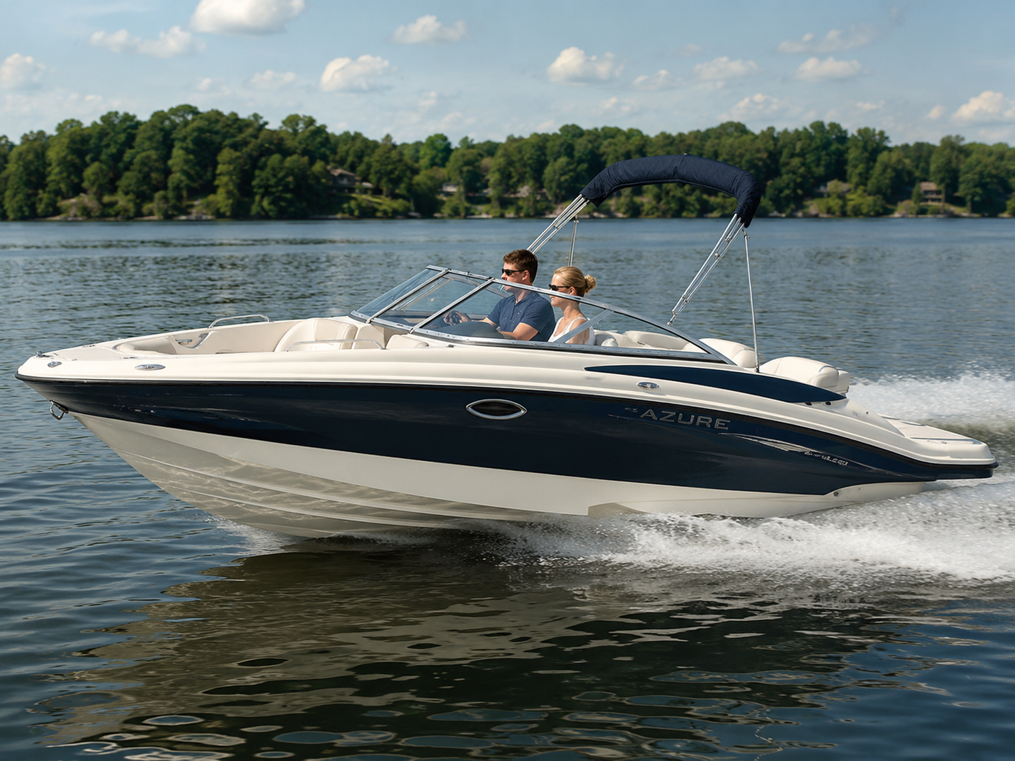 2009 Azure AZ208 bowrider cruising on calm lake water
