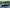 2011-2015 Axis A20 wake boat floating on calm lake water