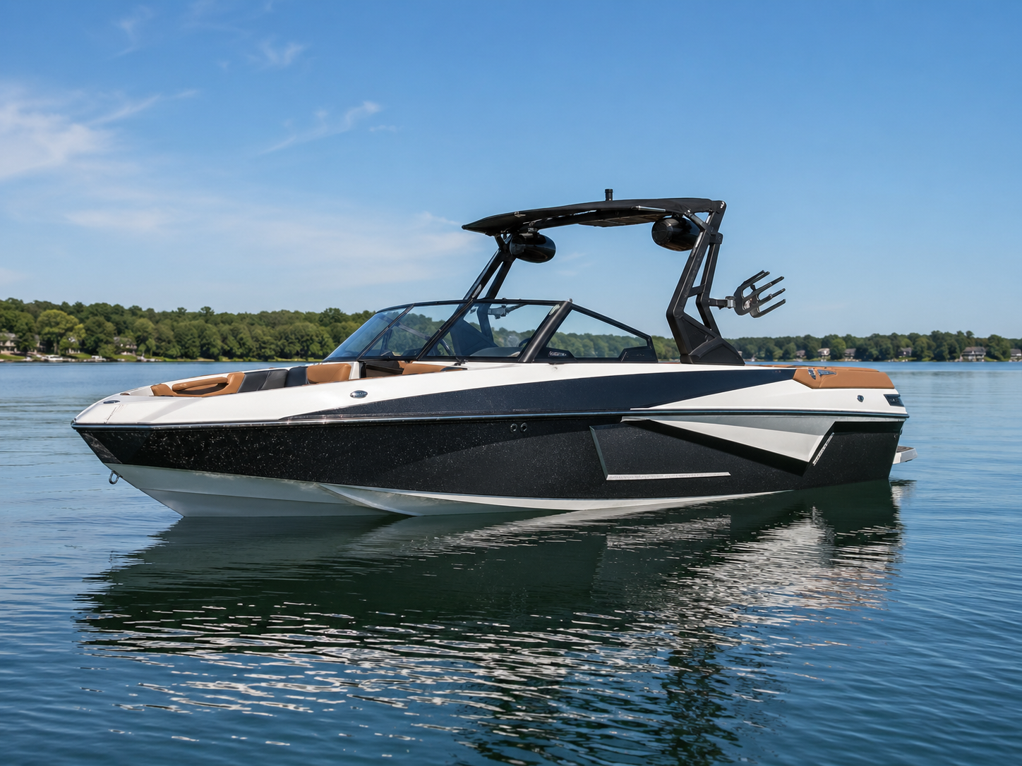 2019-2021 Axis T23 wakesurf boat floating on calm lake water