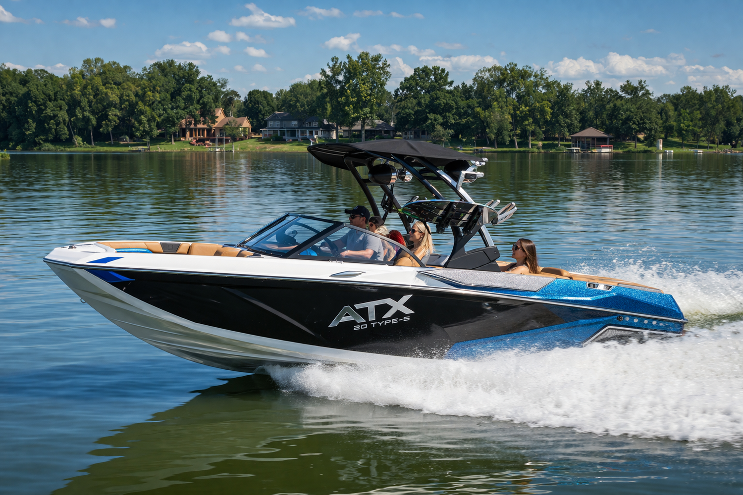 2020-2022 ATX 20 surf boat running on calm lake water